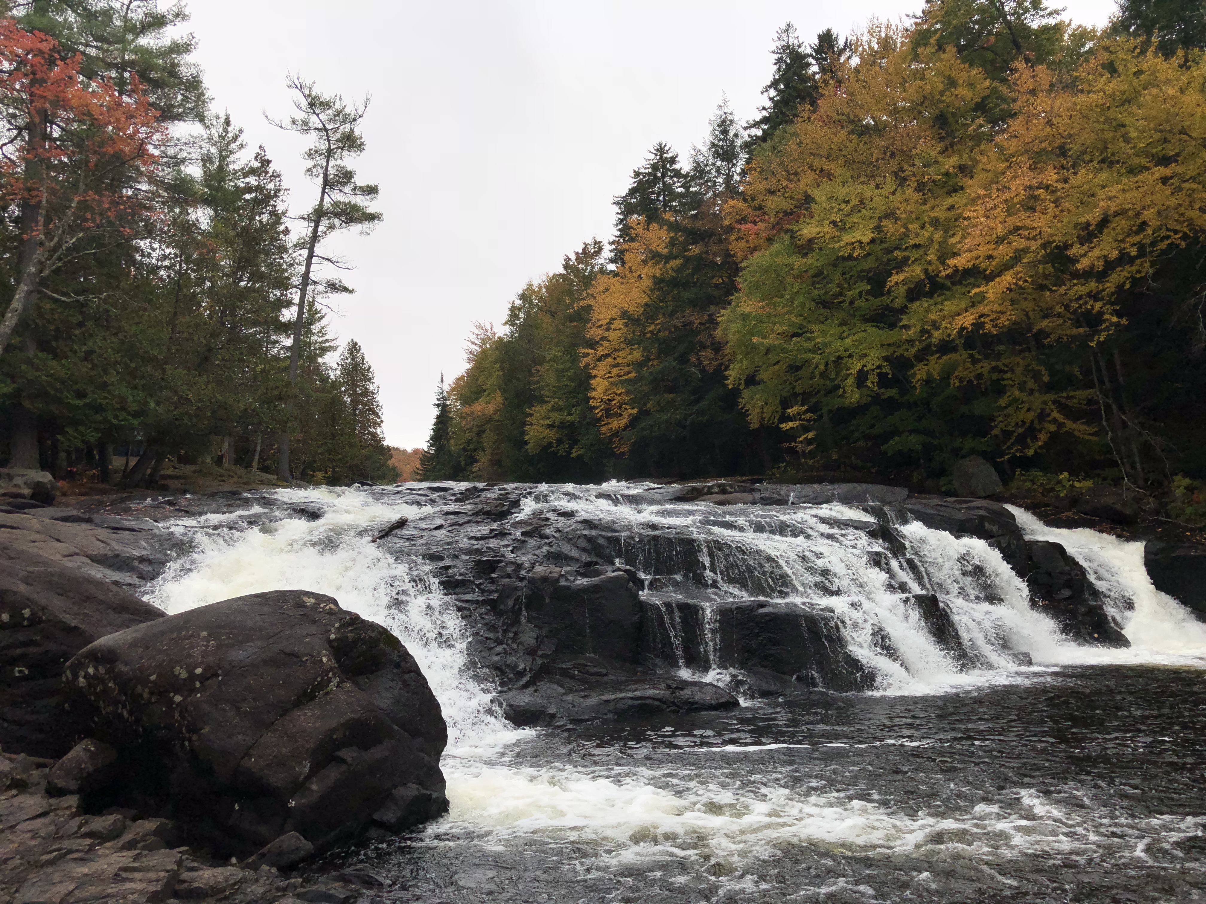 Watching the churning water at Buttermilk Falls News, Sports, Jobs